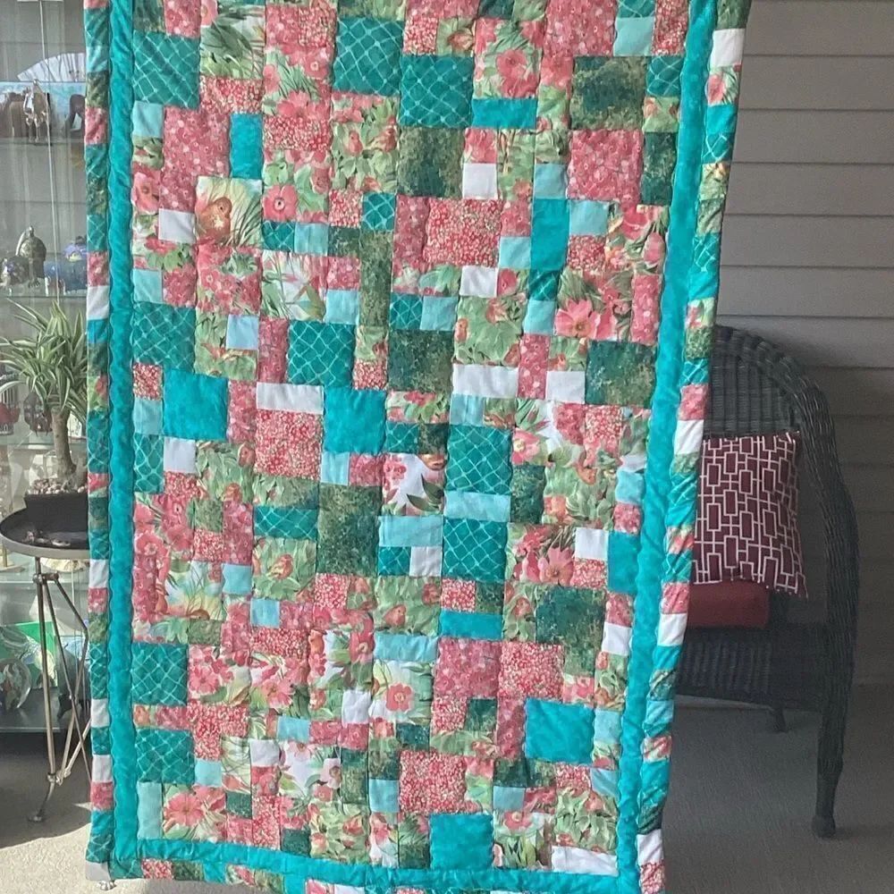 NWT. Turquoises, Corals and Greens Handcrafted Lap Quilt
